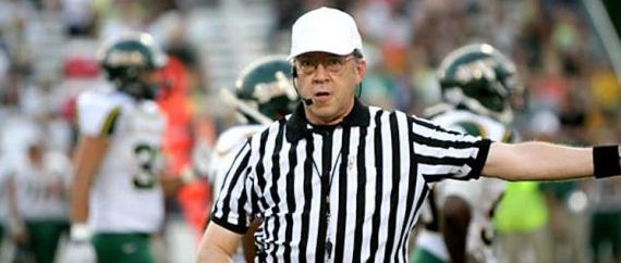 Signalling a penalty in Sept. 2011. 